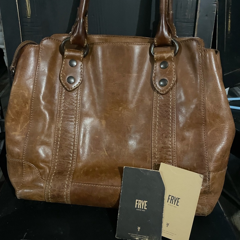 This is a genuine Frye Melissa Tote in great condition.